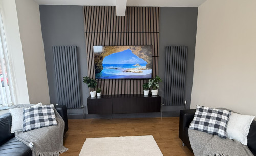 Lounge with media wall at 44 Harland Road